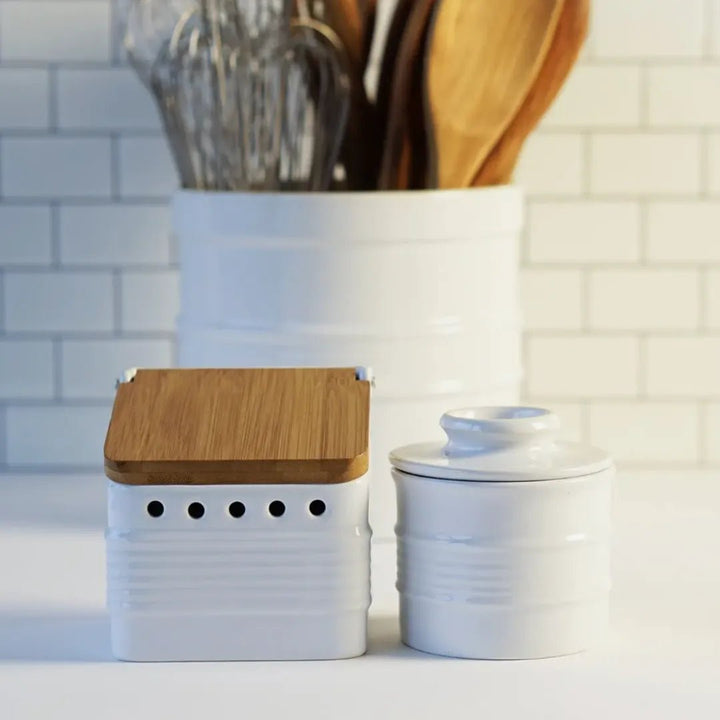 White stoneware garlic keeper for kitchen counter