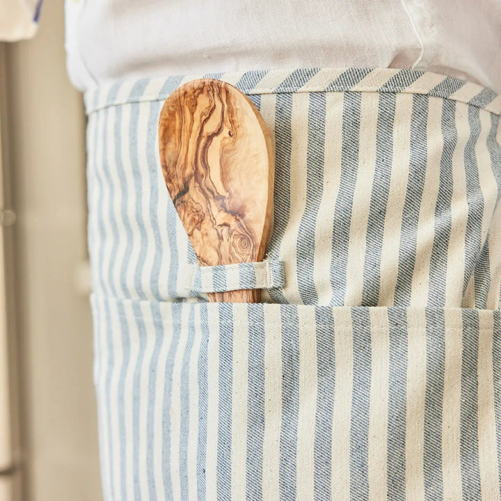 Striped waist apron made from recycled denim in Colombia