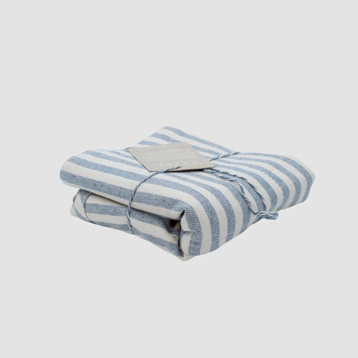 Striped waist apron made from recycled denim in Colombia