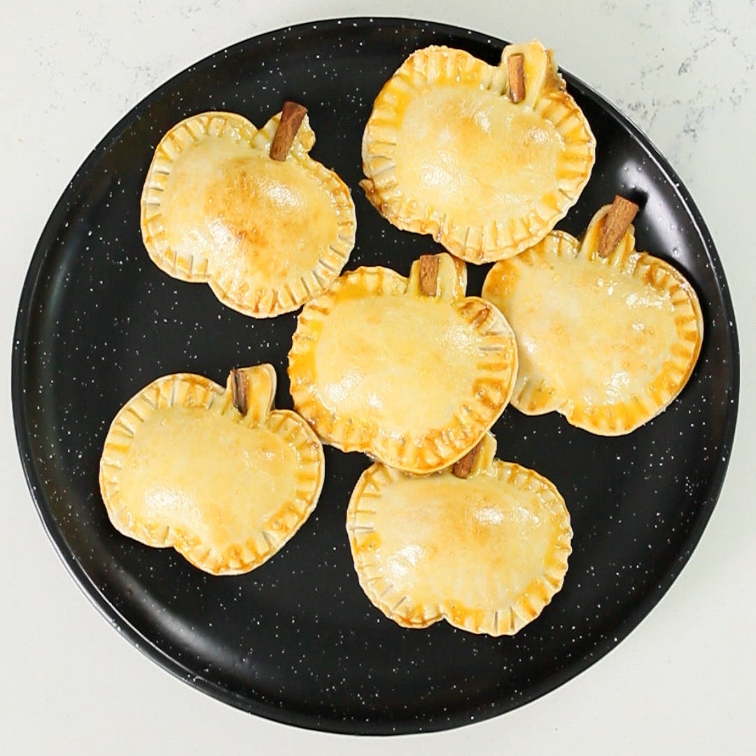Serving guava empanadas at a Halloween party with Latin flair