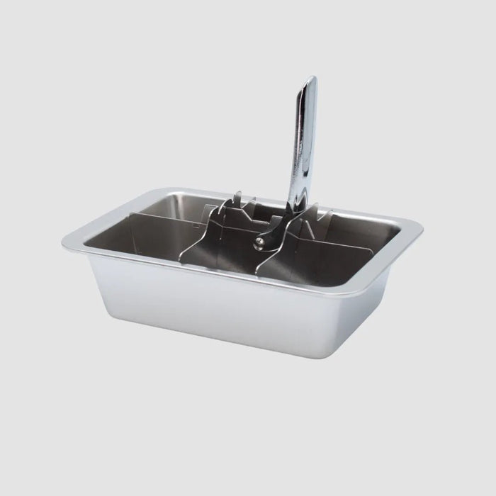 Stainless steel ice cube tray with the divider grid and the upright lever handle in place