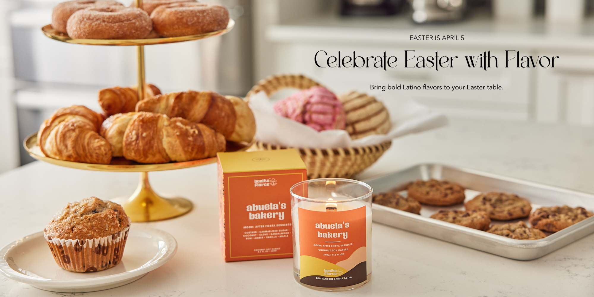 Easter candle and baked goods displayed on a kitchen table celebrating Easter with flavor.